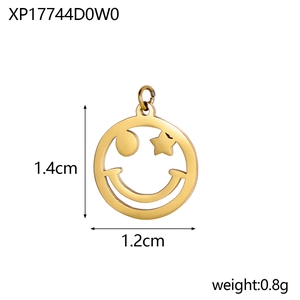 Detailed view of 1.4cm hollow gold smiley face pendant with star eyes and metallic finish
