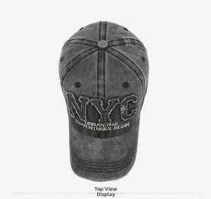 Top view of vintage grey denim baseball cap with NYC embroidery and washed texture