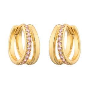 Detail of 18K gold double hoop huggie earrings with shimmering pink cubic zirconia inlay