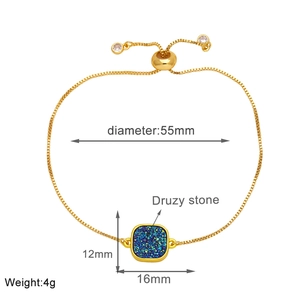 Detail of 18k gold box chain with blue druzy stone and adjustable slider closure