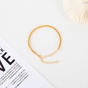 Golden Cuban link chain bracelet with heart magnet and adjustable lobster clasp closure