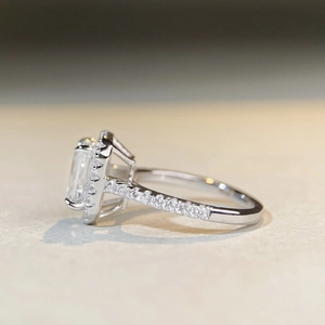 S925 sterling silver ring featuring radiant cut moissanite with halo setting and pavé band