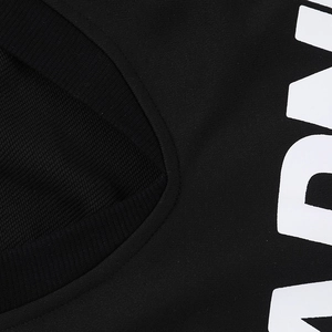 Detail of black cotton sweatshirt neckline featuring high-density knit and white printing