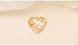 Detailed view of heart-shaped gold pendant with moon and star zircon accents