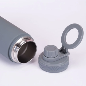 Detail view of smooth wide mouth and circular carry handle of the stainless steel sport flask