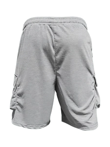 Detail of light gray cargo shorts with large side pockets and elastic waistband texture