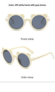 Detailed view of cream bear-ear sunglasses with grey lenses for kids in two angles