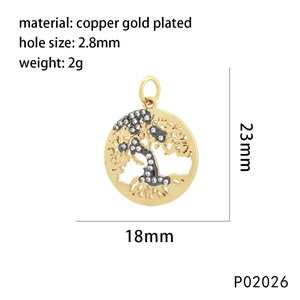 Macro view of a 18k gold plated copper tree of life pendant with white crystals