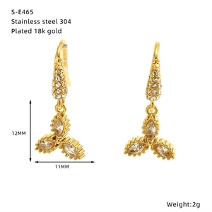 Detailed view of 18k gold plated clover earrings with cubic zirconia and 12mm dimensions
