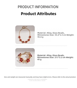 Detail of flower necklace and bracelet set with red glaze beads and rhinestones