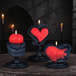 Gothic snake and heart decorative candle set with intricate black scales and red wax