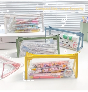 Detailed view of colorful transparent PVC pencil cases showing high storage capacity