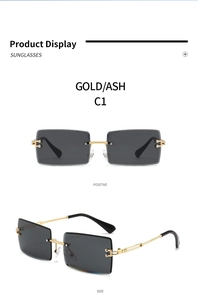 Detailed view of fashionable gold rimless square sunglasses featuring dark grey gradient lenses