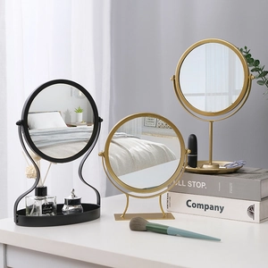 Nordic metal makeup mirrors in gold and black with jewelry storage trays for vanity table