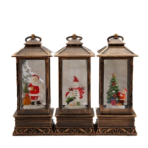 Vintage bronze Christmas lanterns set with santa snowmen figurines and swirling water glitter