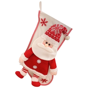 Christmas stocking with 3D cartoon Santa Claus doll in red knitted sweater and white snowflakes