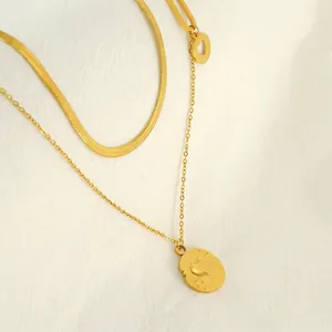 Double-layered gold stainless steel necklace with snake chain and heart pendant