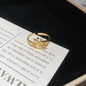 Detailed macro view of the gold meteor star ring with sparkling cubic zirconia in a jewelry box