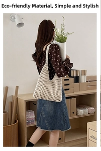Detail of hand-woven hollow mesh cotton rope bag in beige for summer beach vacation