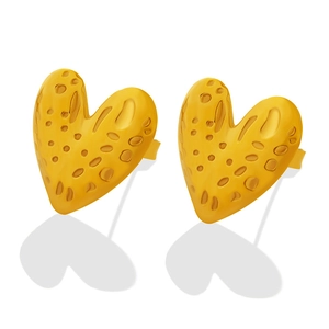 Chic golden heart stud earrings featuring a unique textured finish on a white backdrop