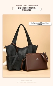 Detail of black woven texture tote bag with brown inner pouch and kangaroo logo