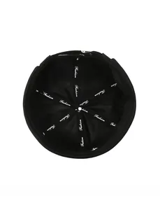 Detailed interior view of a black docker hat with Fashion branded seam tape reinforcement