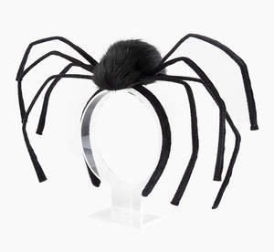 Detailed view of a black plush Halloween spider headband with adjustable long legs