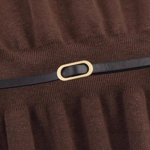Brown ribbed knit top featuring a slim black belt with a golden oval metal buckle