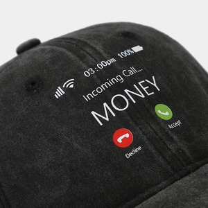 Close-up of money incoming call print on black vintage washed cotton baseball cap