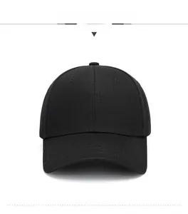 Detailed texture view of a classic black baseball cap featuring a six-panel structured design