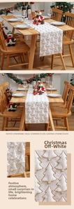 Close-up of golden Christmas tree embroidery on cream fabric table runner for dining decor