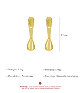 Detailed macro view of gold alloy teardrop earrings with a 2.1cm height specification