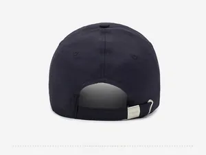 Rear view of navy blue baseball cap showing stitching detail and metal adjustment buckle
