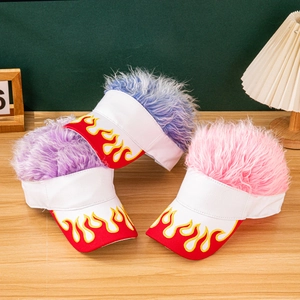 Detail view of colorful wig caps with red flame patterns on brims in multiple shades