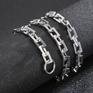 Macro view of stainless steel rectangular link chain with OT clasp for a punk look