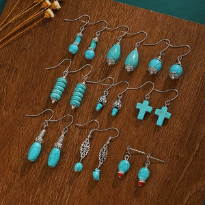 Set of 9 pairs of Bohemian vintage turquoise earrings with silver retro metal charms