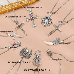 Detailed set of 10 vintage silver necklaces featuring gothic cross and wolf tooth charms