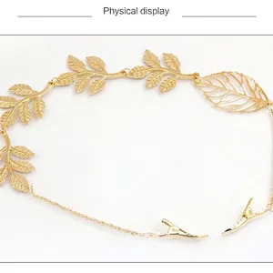 Elegant gold leaf hair accessory with alloy leaves and long chain fringe on white background