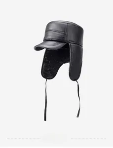 Detailed view of winter leather flat cap with ear flaps and warm plush lining