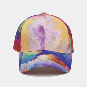 Detailed close-up of a colorful tie-dye baseball cap with artistic nebula print design