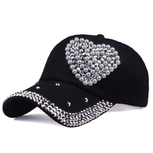 Black cotton baseball cap with heart pearl design and rhinestone brim decoration