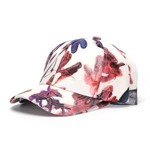 Close-up of floral print baseball cap featuring detailed stitching and premium fabric