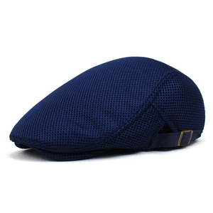 Detail of navy blue mesh hat featuring breathable fabric and adjustable metal side buckle