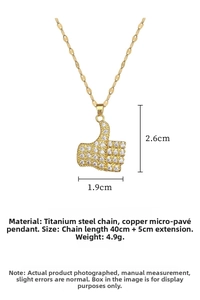 Detail view of gold thumb gesture pendant with sparkling white zircons on titanium chain