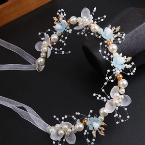 Golden leaf headband with faux pearls and blue silk flowers for bridal hairstyles