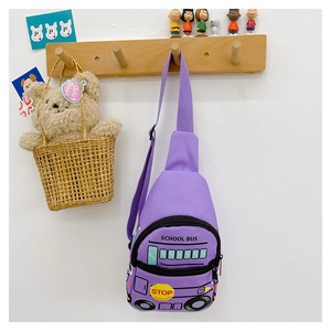 Detail view of purple cartoon school bus chest bag for kids with adjustable strap
