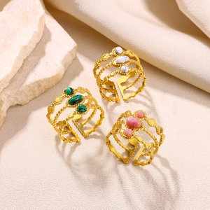 Three-layer gold stainless steel rings with white, green and pink stone inlay details