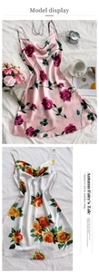 Detail of silk satin floral slip dress with delicate V-neck and rose print patterns