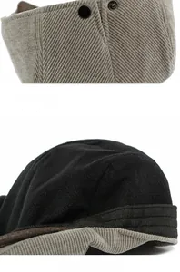Detailed view of warm corduroy fabric texture and soft fleece lining of the winter beret cap