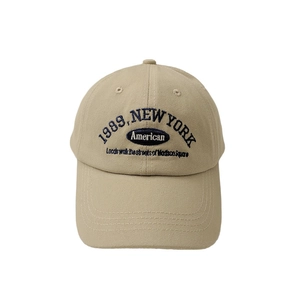 Vintage khaki cotton baseball cap with blue 1989 New York embroidery and adjustable strap